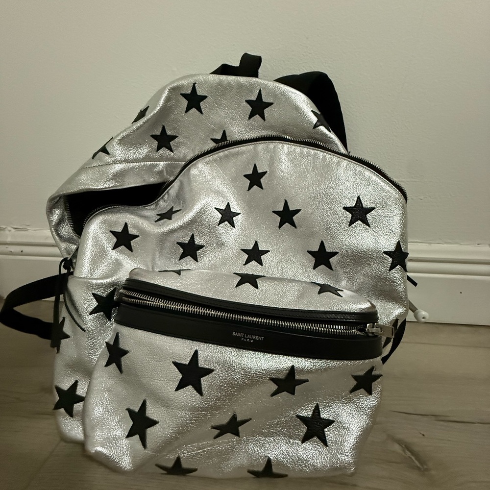 Yves Saint Laurent Metallic Backpack with Black Stars
